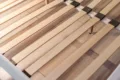 Wooden slats for arthopedic base of double bed. Interior structure of furniture